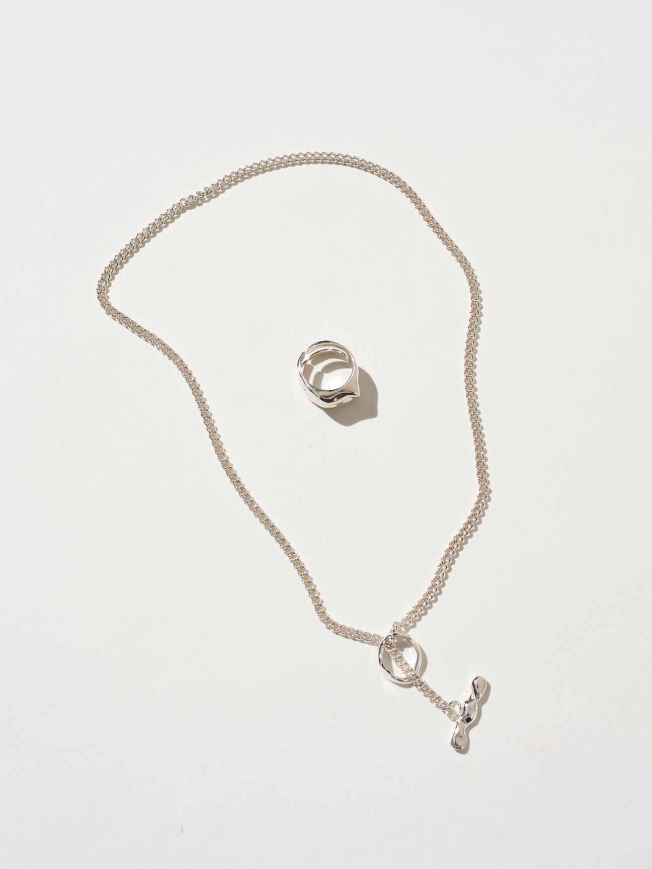 Minimalist silver jewellery pieces from Apiliotis showing stackable ring bands
