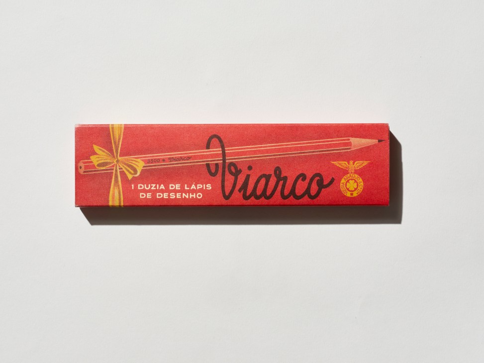 Red vintage Viarco pencil box with yellow ribbon design and Portuguese text