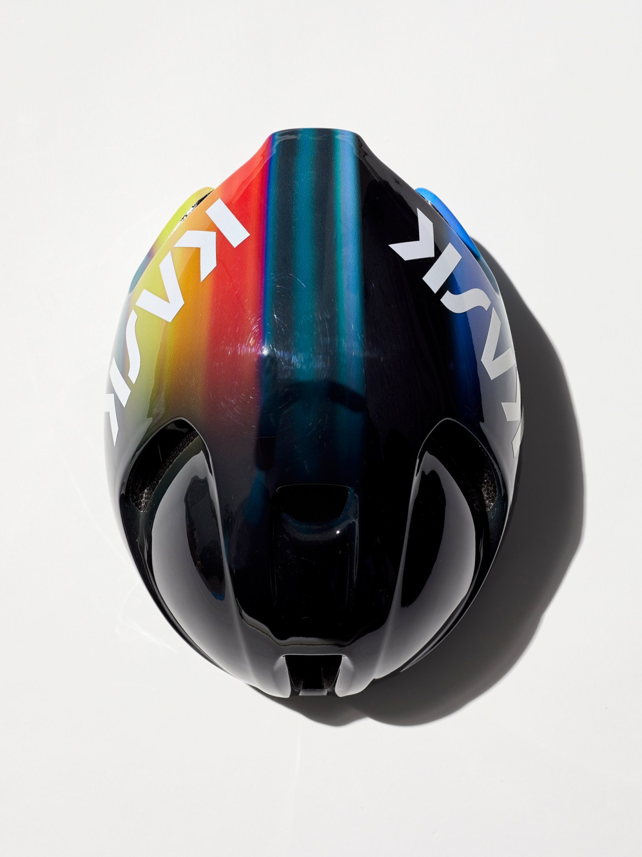 Paul Smith collaboration cycling helmet with Kask in minimalist design a colorful cycling helmet with rainbow gradient design and white text branding on black base