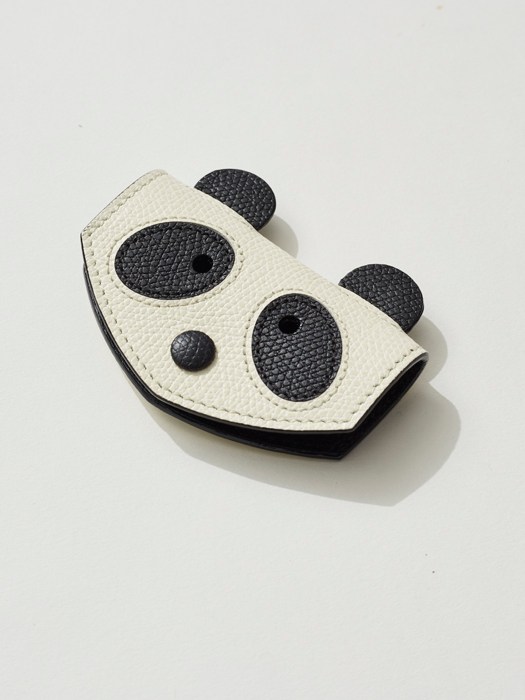 Valextra panda-shaped purse in cream and black grain leather with lacquered edges.
