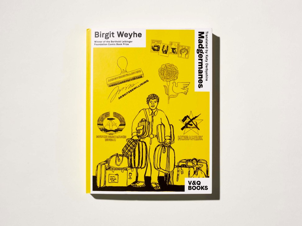 Yellow book cover of Madgermanes by Birgit Weyhe showing illustrated figure with luggage and various stamps