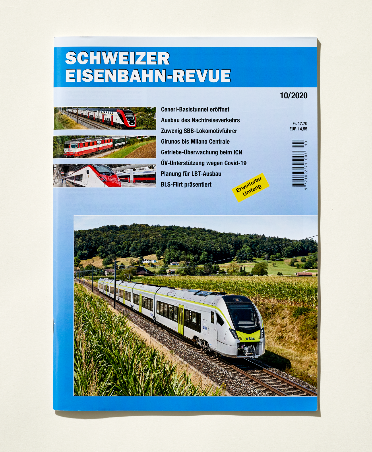Cover of Schweizer Eisenbahn-Revue magazine issue 10/2020 featuring a white and yellow train traveling through Swiss countryside.
