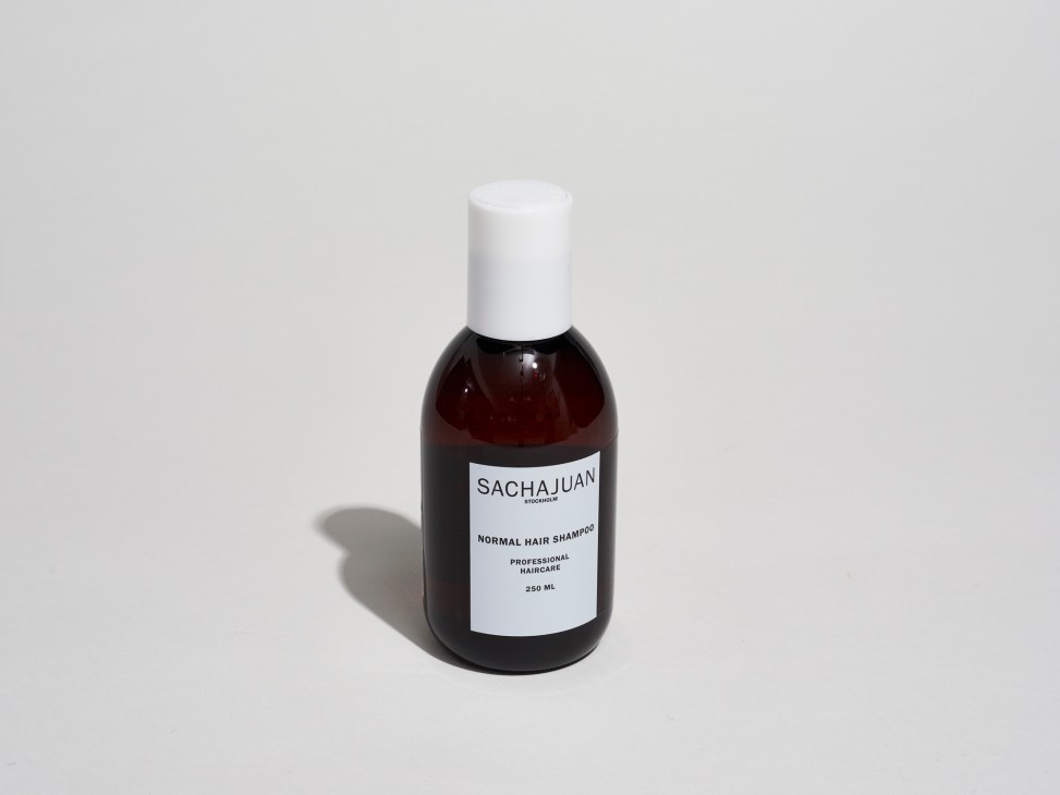 Sachajuan Normal Hair Shampoo 250ml bottle with white cap against gray background.