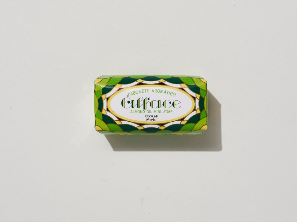 Claus Porto almond oil mini soap with green and gold ornate packaging.