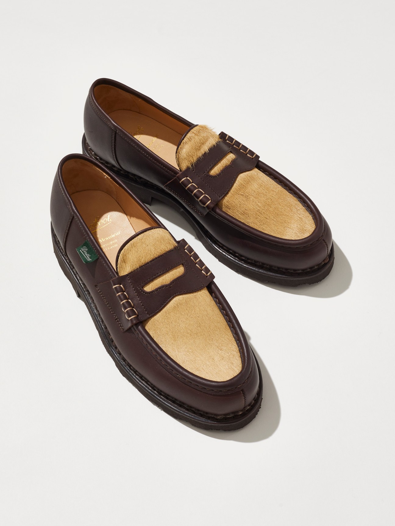 Brown leather loafers with mustard calfskin details and wide brown soles by Paraboot x Drôle de Monsieur