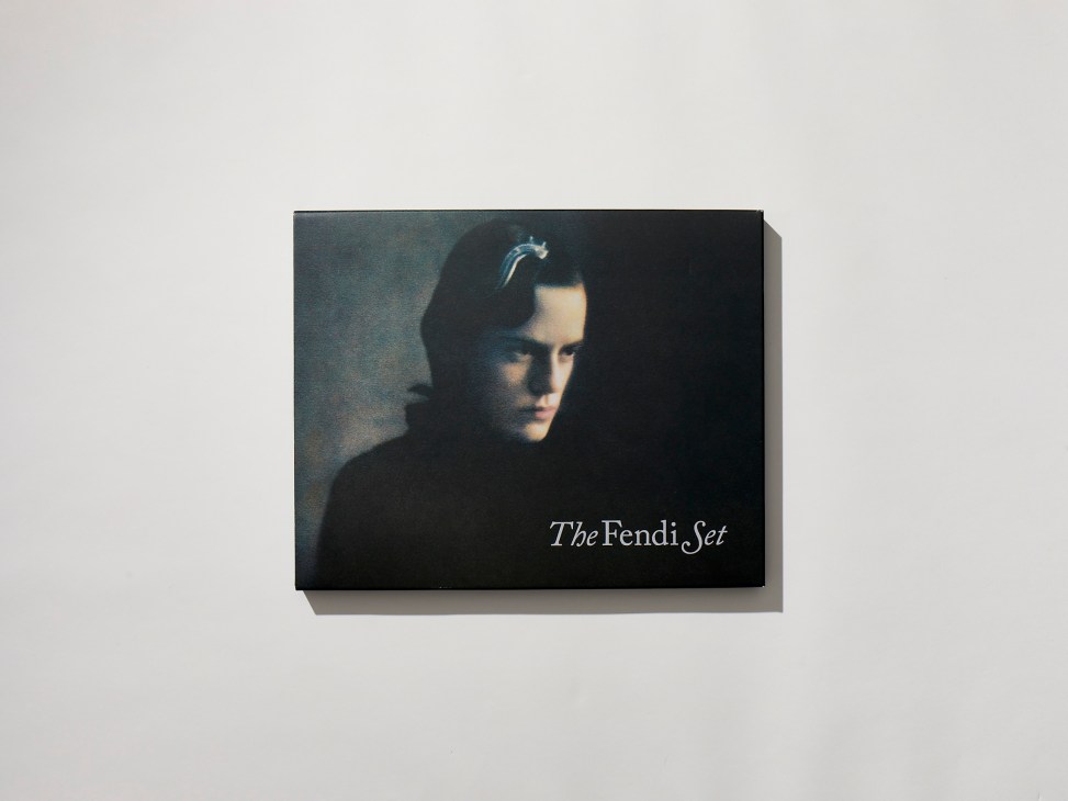 The Fendi Set book cover featuring a dark portrait photograph