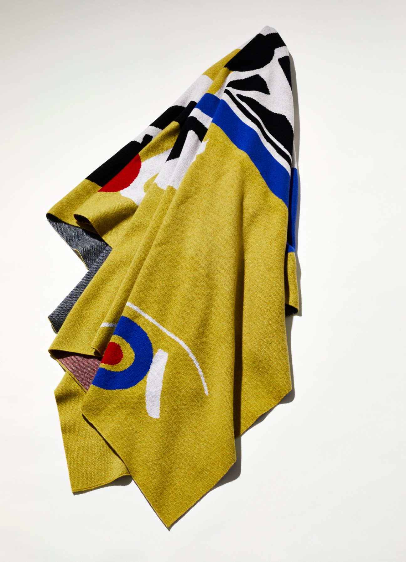 Arshile Gorky blanket with yellow, blue, red, black and white abstract geometric design
