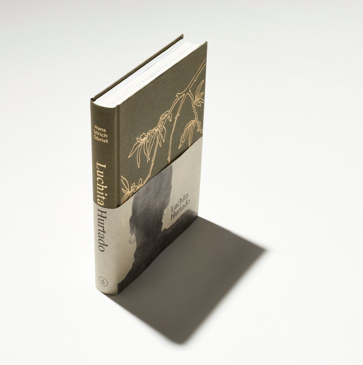 Hardcover art book 'Luchita Hurtado' with olive and cream cover design featuring botanical line drawings