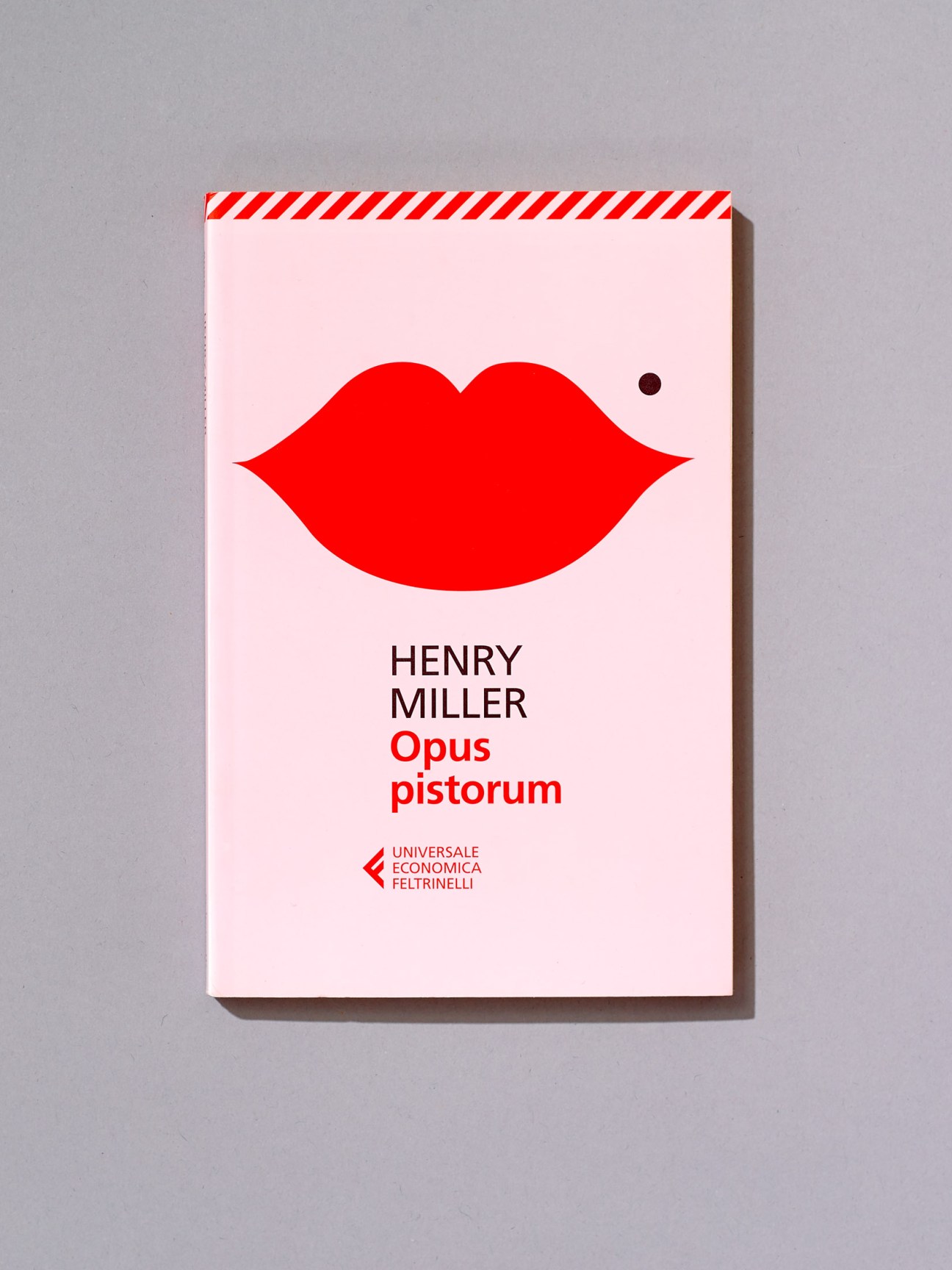 Book cover of 'Opus Pistorium' by Henry Miller designed by Olimpia Zagnoli, featuring a bold red lips illustration on pale pink background.