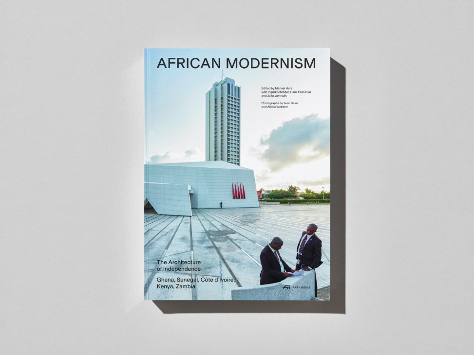 Book cover showing modern African architecture with two men in suits sitting on concrete steps