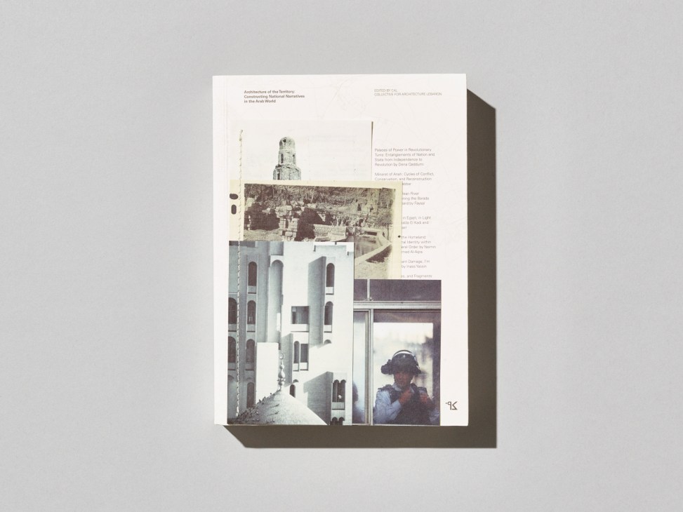 Open architecture book showing white modernist buildings and construction photos with descriptive text