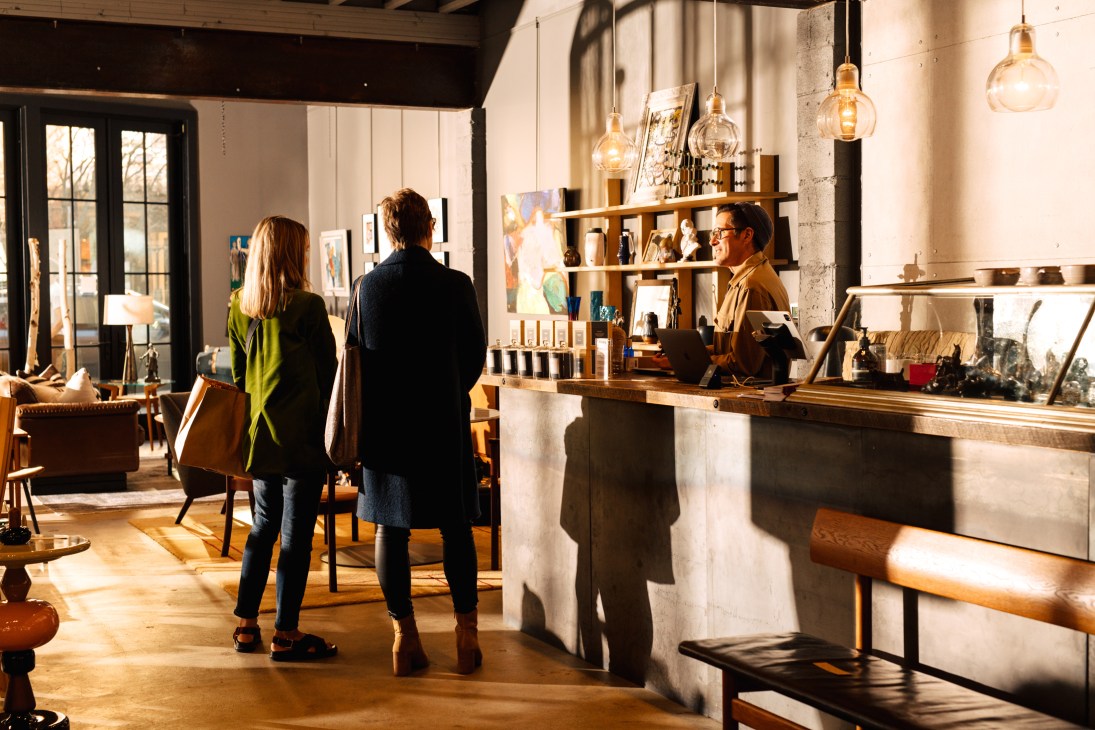 Interior of Finch shop with mid-century furniture, decorative objects and homeware displayed on shelves and tables