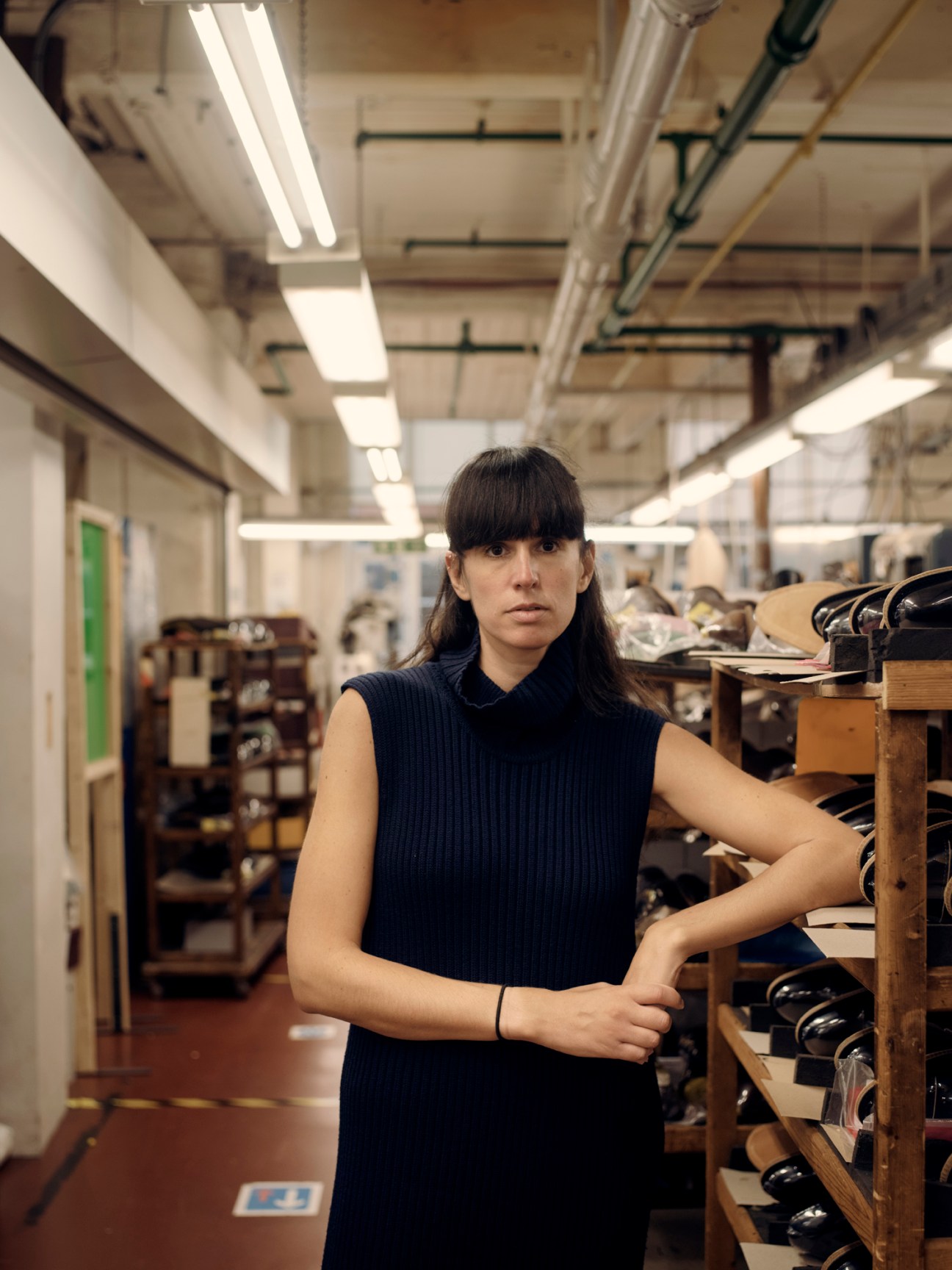 John Lobb craftsperson working on a shoe last