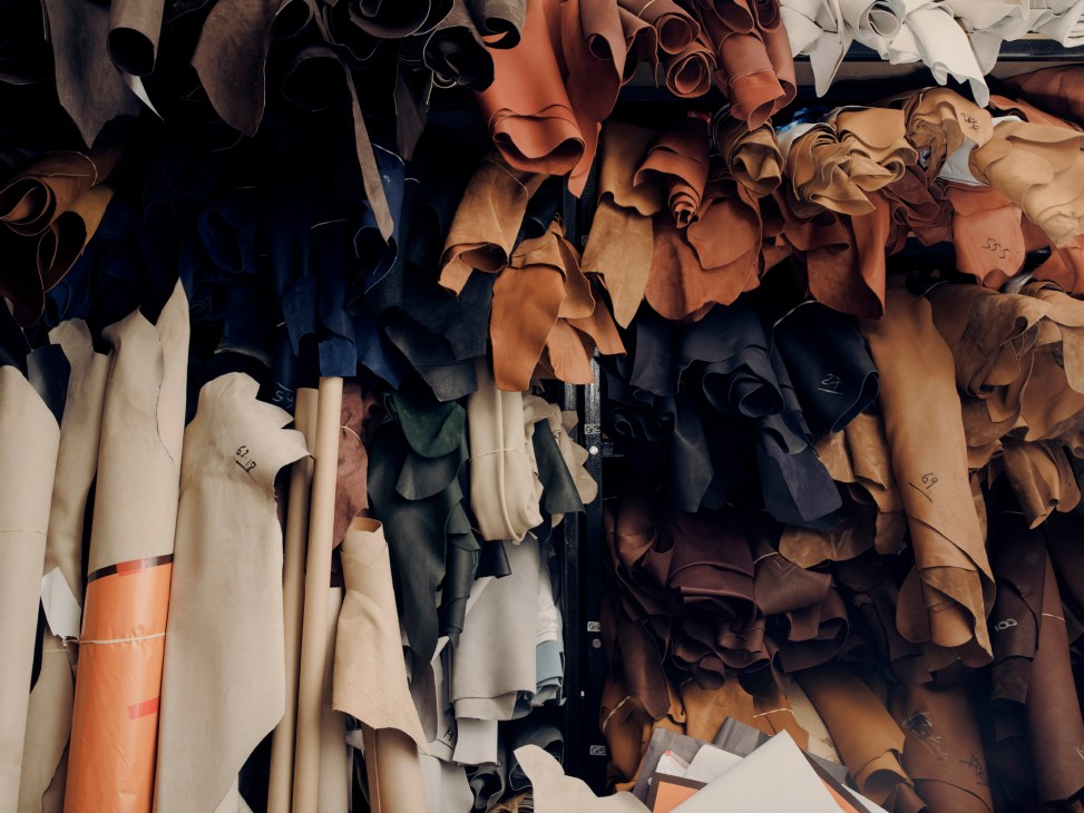 Collection of leather pieces in various colors and textures arranged together