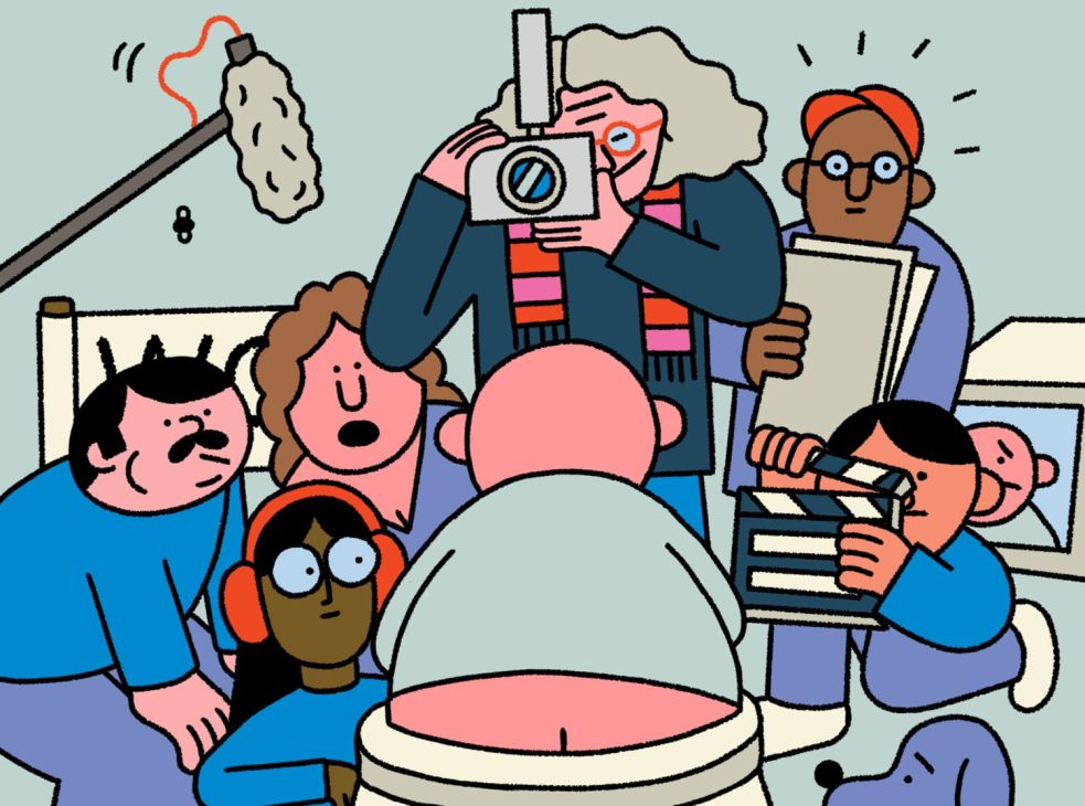 Cartoon illustration of people with cameras and equipment filming around a toilet bowl in what appears to be a bathroom