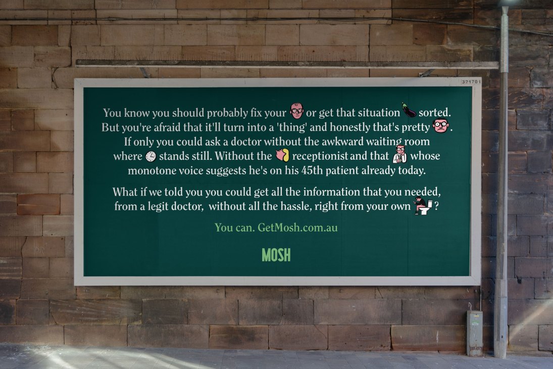 Advertisement billboard for Mosh telehealth service featuring humorous copy about avoiding doctor's waiting rooms, displayed on brick wall