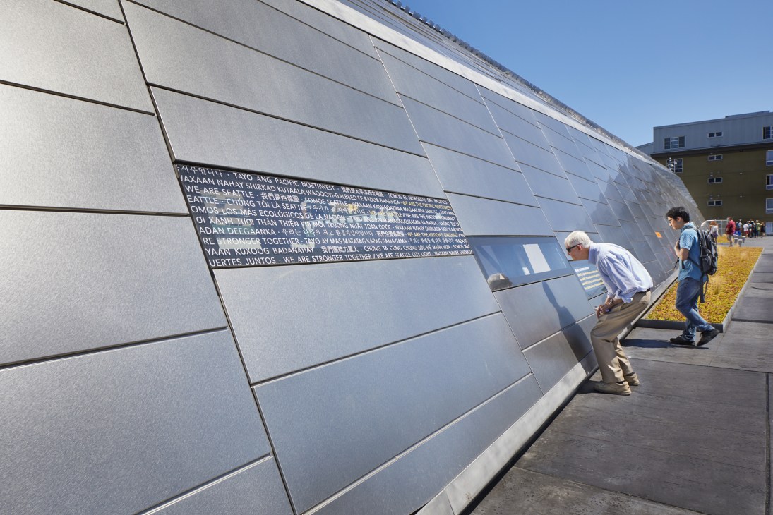 Close-up architectural detail of the Denny Substation's stainless steel facade and geometric design