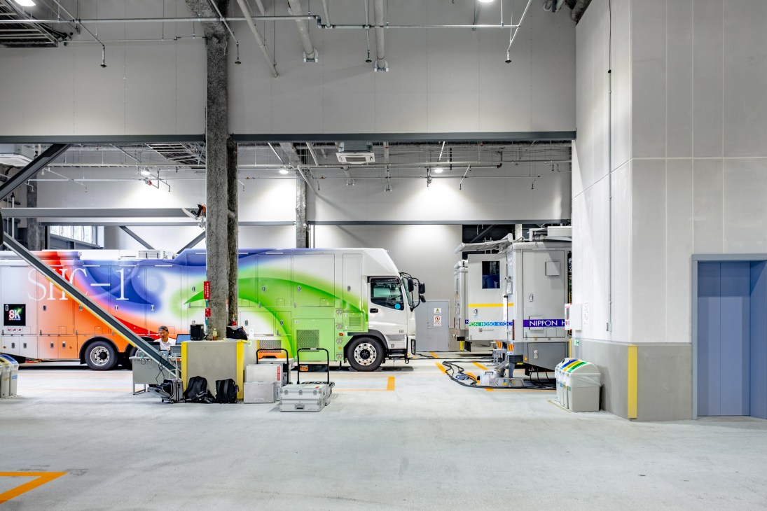 NHK's white 8K broadcast van parked at headquarters facility