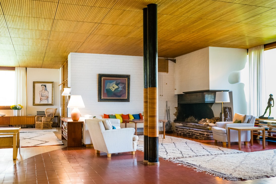 Interior view of Villa Mairea living room showing Aalto-designed furniture and modern decor