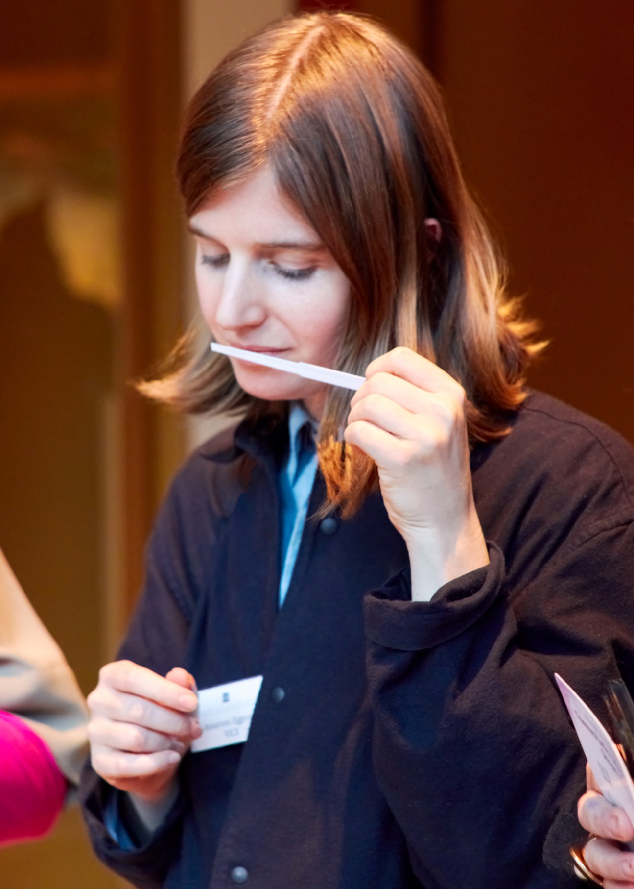 young woman trying scents