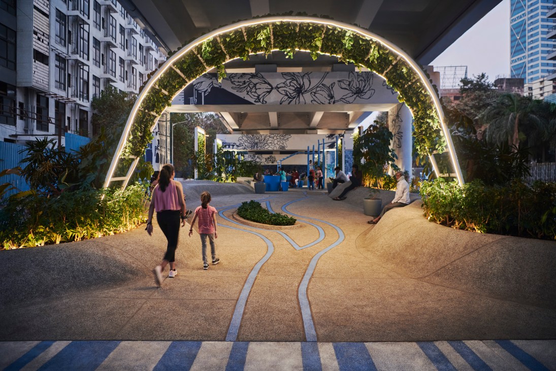 One Green Mile linear park in Mumbai with curved archway covered in greenery and blue pathway stripes