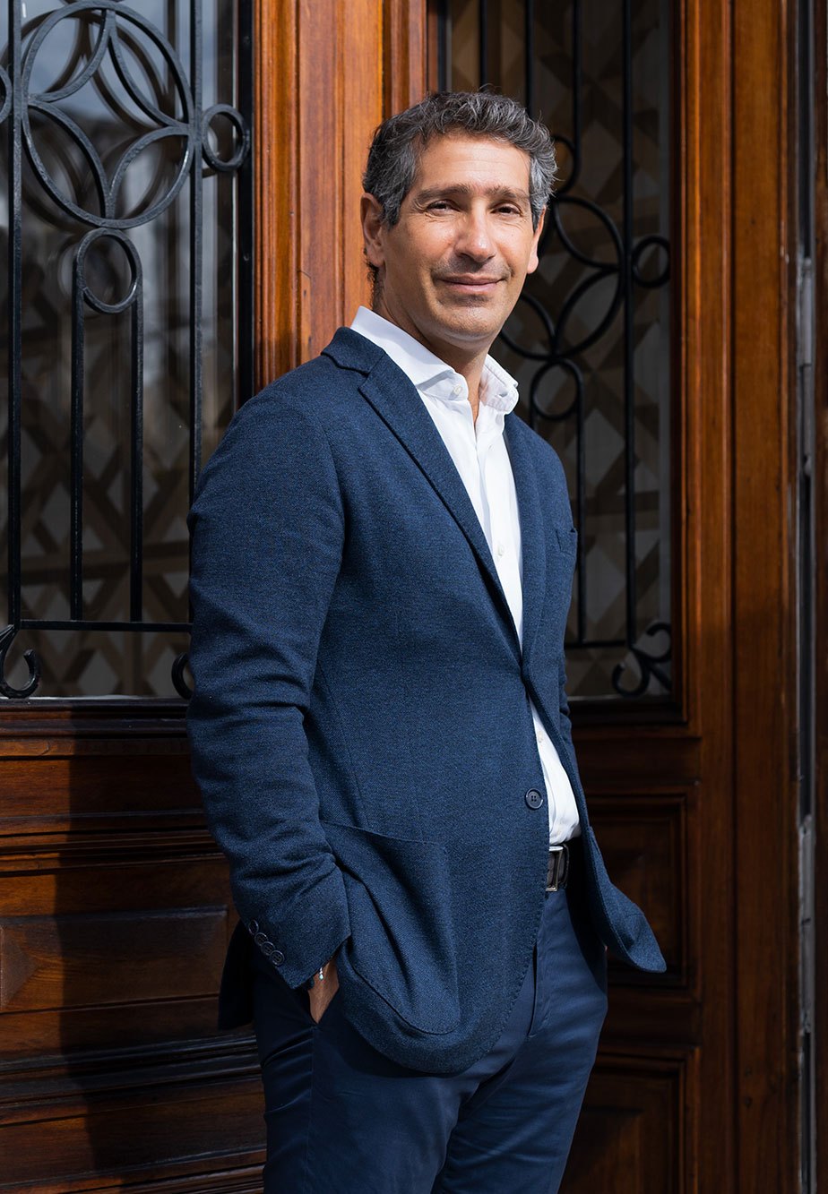 Philippe Peress standing outside the Quartier des Banques building in Geneva