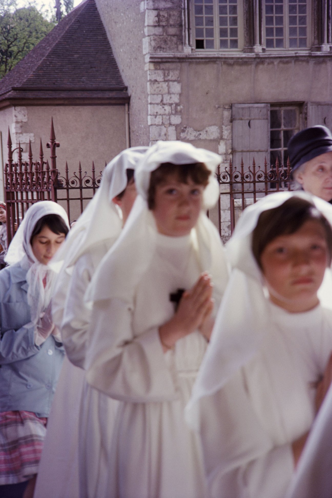 Nuns in black habits walking together on a street, showing religious devotion in daily life