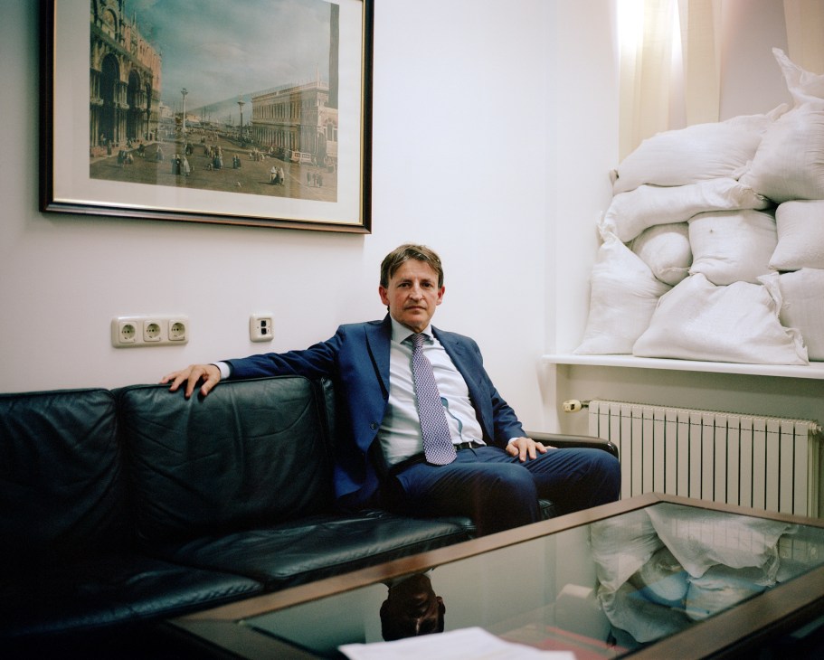 Italian Ambassador to Ukraine Pier Francesco Zazo sitting on a leather couch in his office
