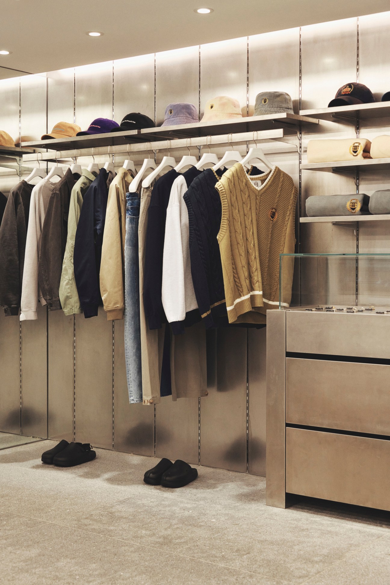 Detail shot of menswear items hanging in 8Division store