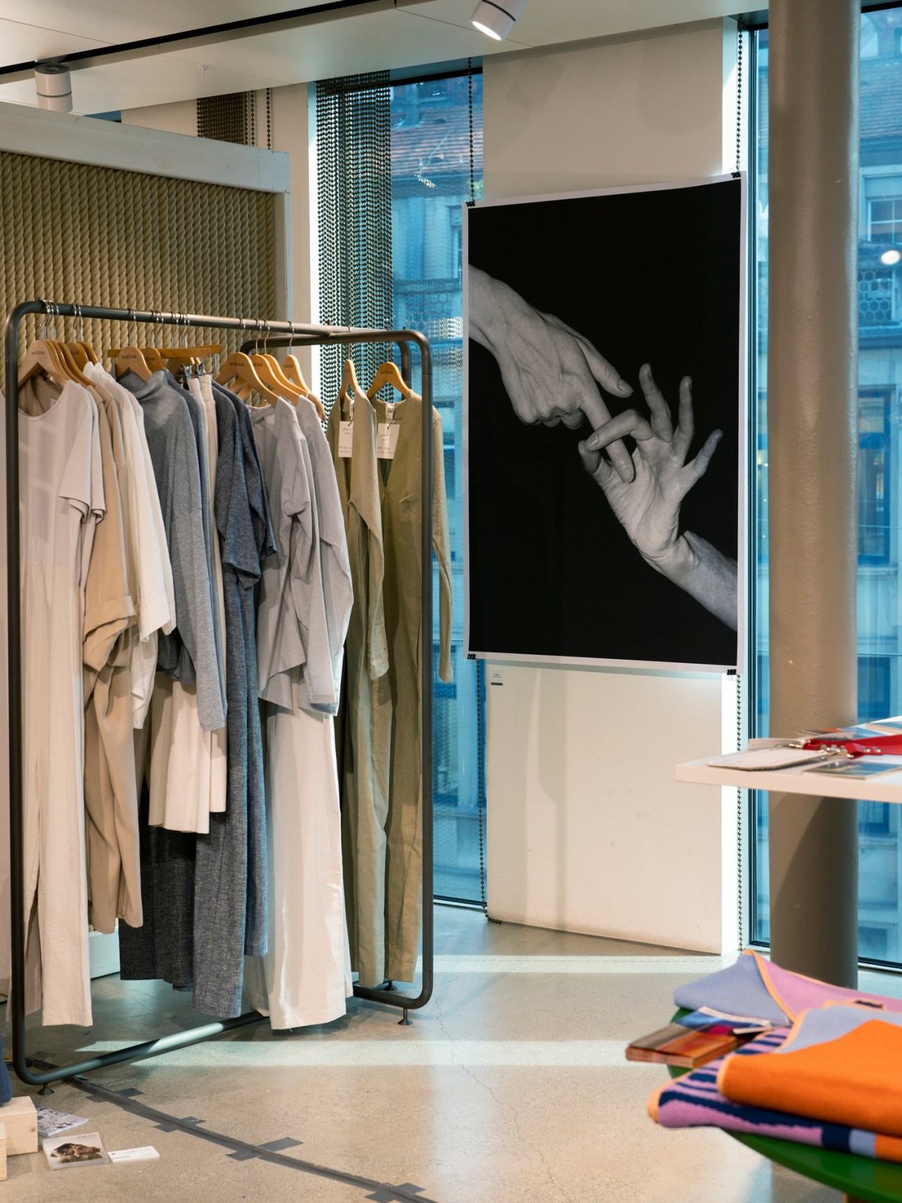People browsing clothing at pop-up retail space