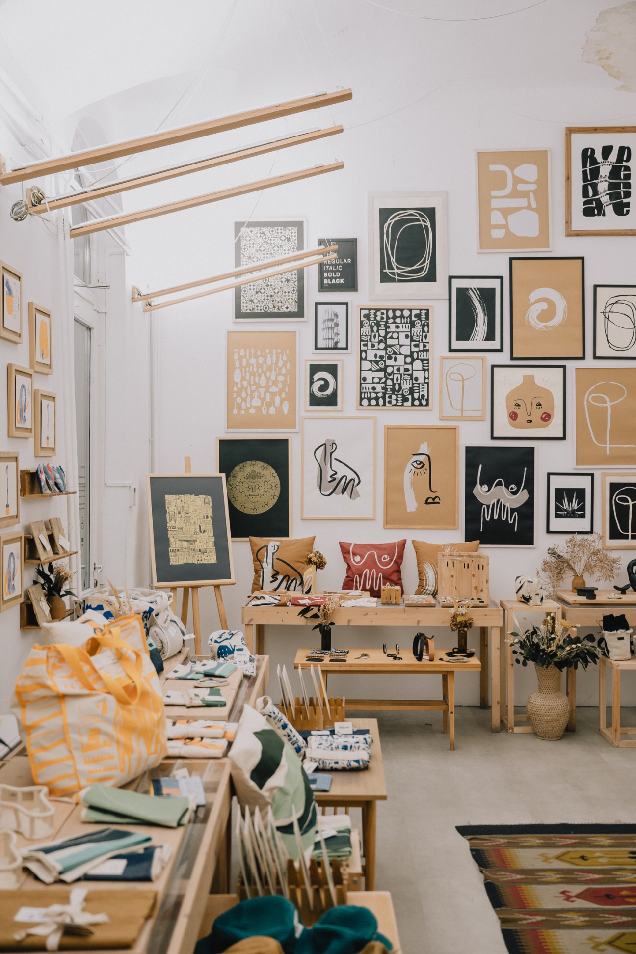 Interior of Printa Concept Store showing screen-printing studio and artistic prints