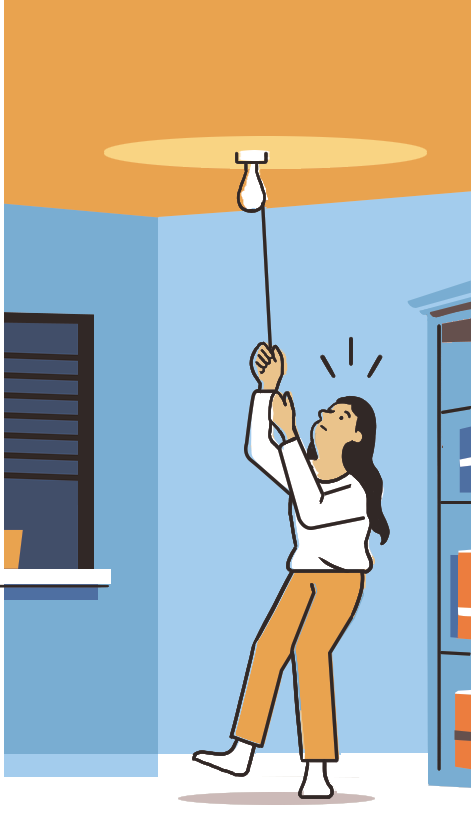 Person pulling on a rope to turn off a ceiling light fixture in a blue room