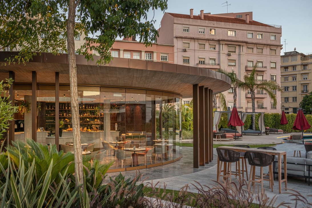 Ritz Pool Bar terrace in Lisbon with pool, terracotta loungers and city views