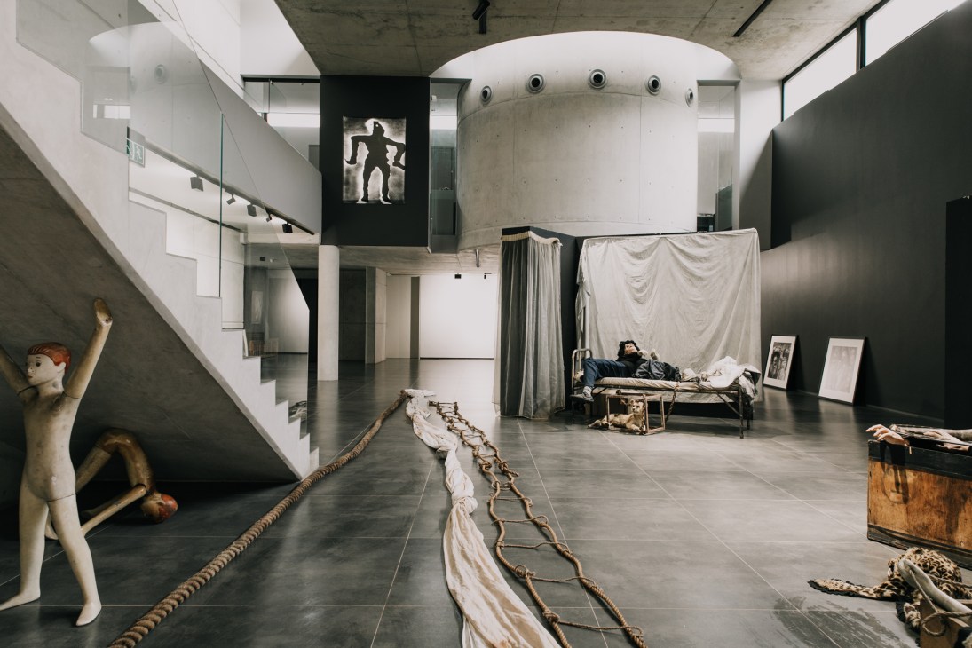 Modern concrete building with geometric design and circular openings