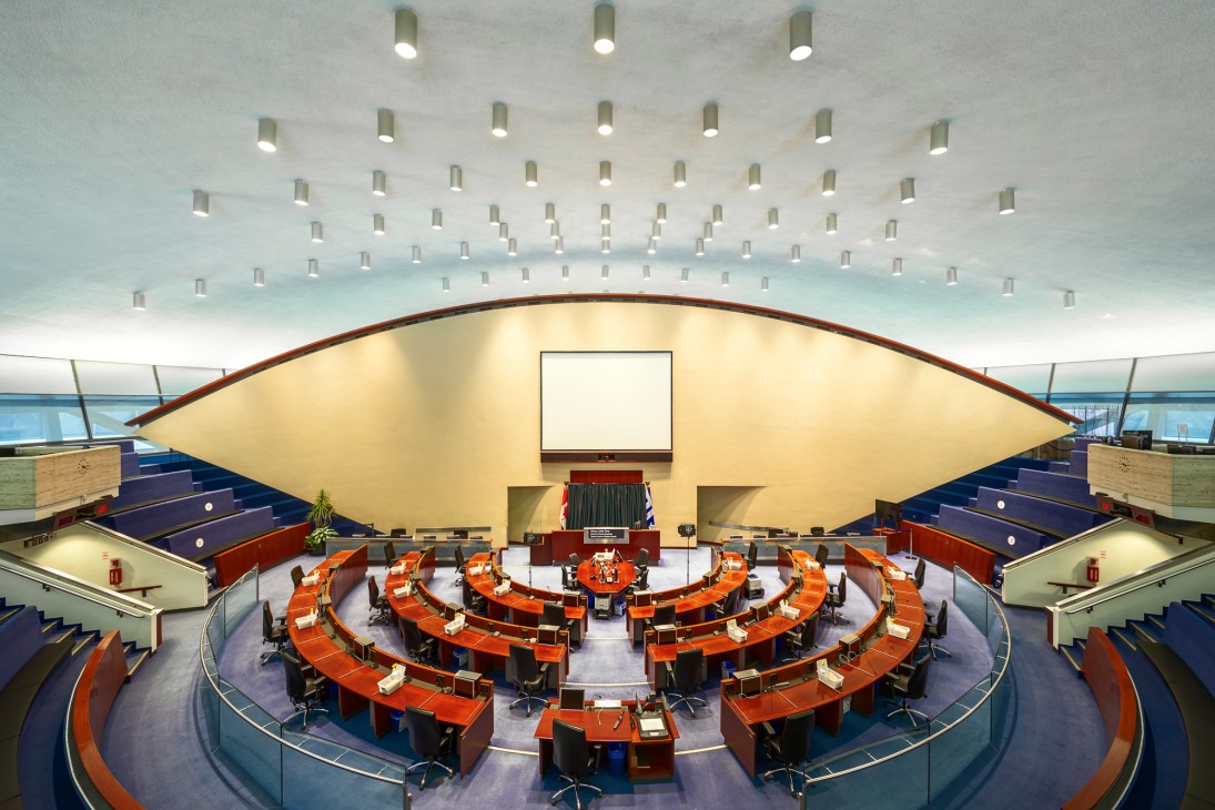 Toronto City Hall's Council Chamber showing curved seating arrangement and modernist design within the concrete dome structure