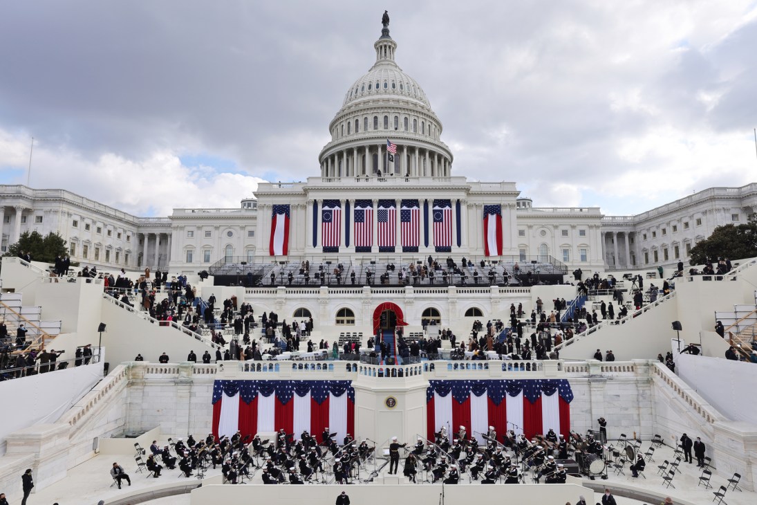 Musicians preparing their instruments before the inauguration ceremony