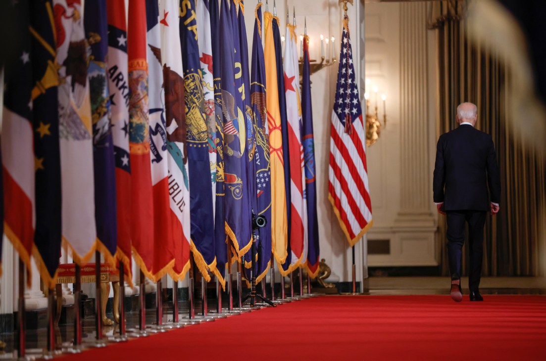 Biden walking away from podium after delivering his first primetime address