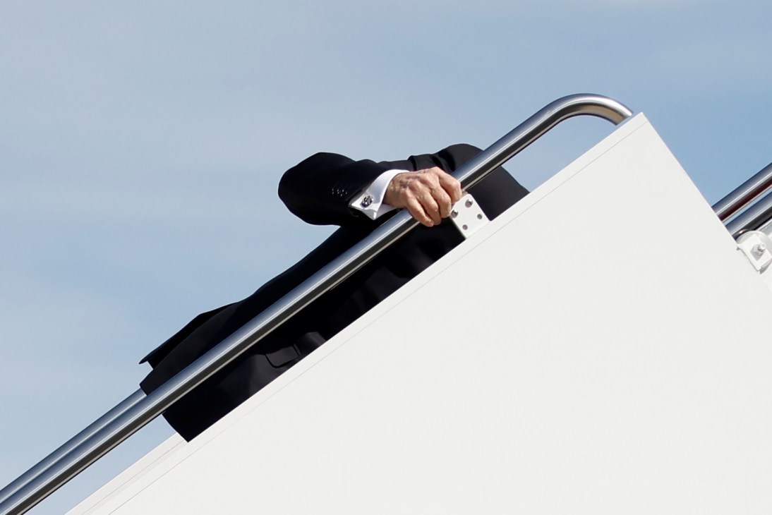 Biden stumbling while walking up the steps of Air Force One
