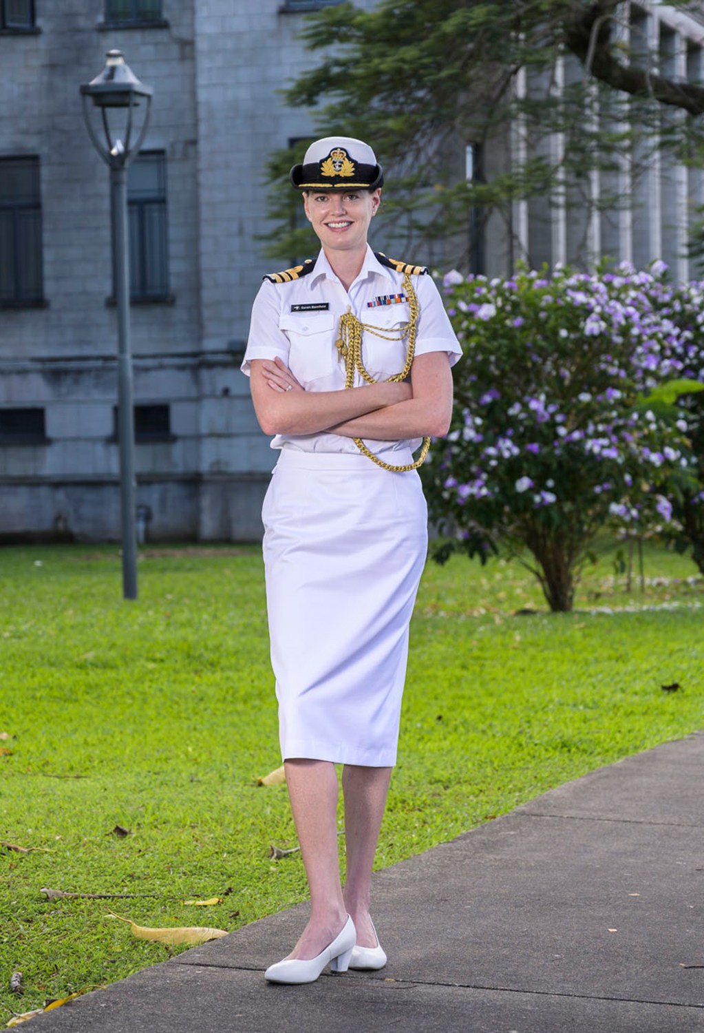 Sarah Bamfield, New Zealand defence attaché in Fiji, wearing white naval uniform with gold braiding and hat