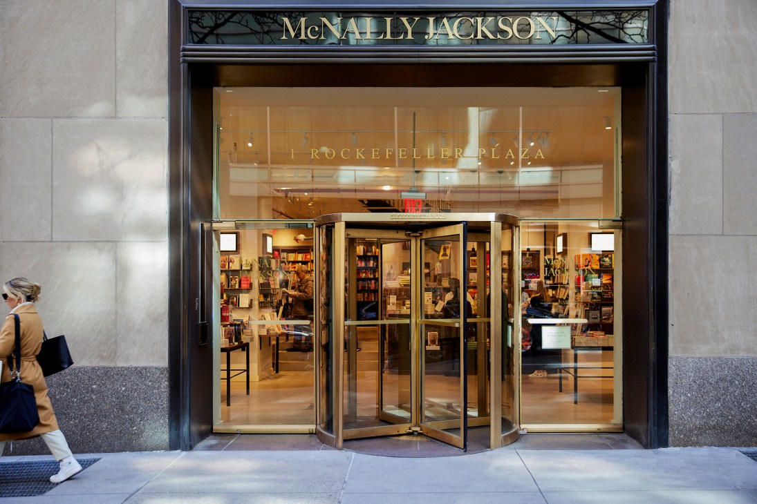 McNally Jackson bookstore storefront at Rockefeller Center with large windows showing timber interior and book displays