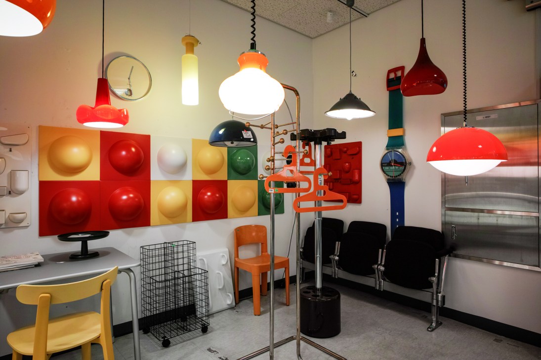 Vintage furniture and lighting display at Samuel Smalls shop featuring colorful mid-century modern pieces.