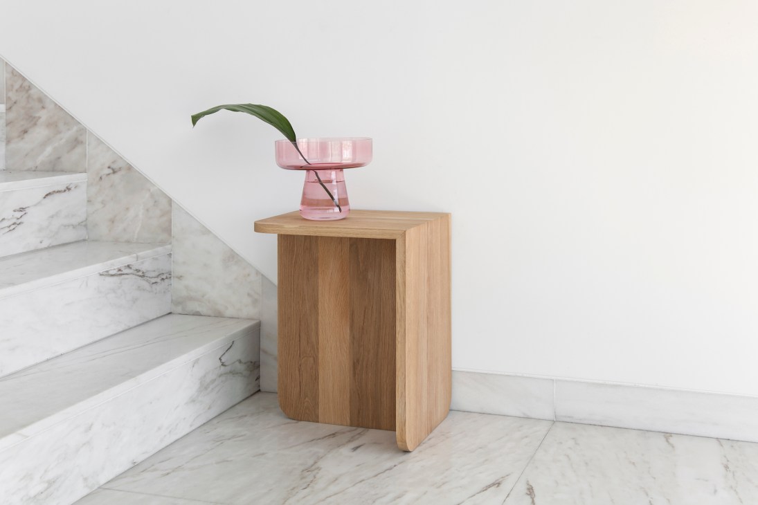 Minimal oak Sidable side table by Skaldu showing clean geometric design on marble floor