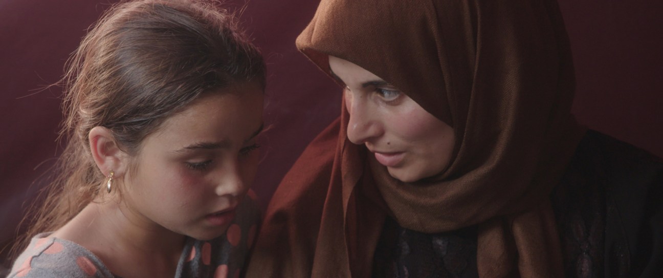Scene from documentary Simple as Water showing intimate family moment