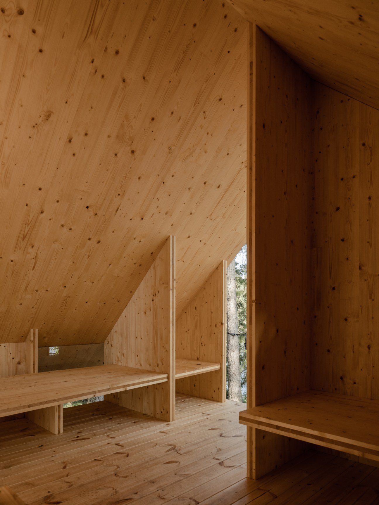 Interior wooden architecture by Nadén Arkitektur showing detailed timber construction and craftsmanship