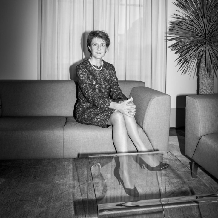 Simonetta Sommaruga sitting on a sofa in a black and white portrait photograph