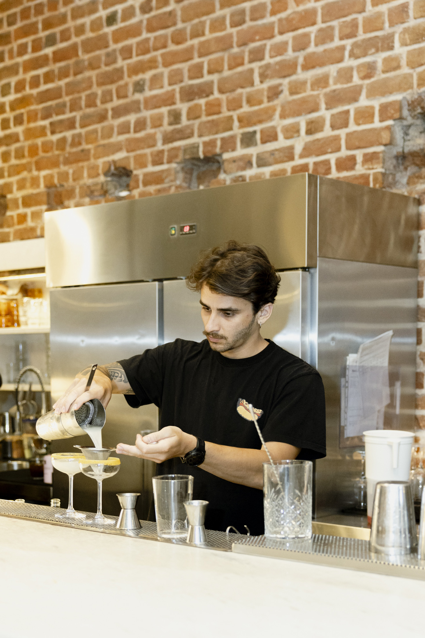 A barman preparing a cocktail at Ypsilon in Thessaloniki.
