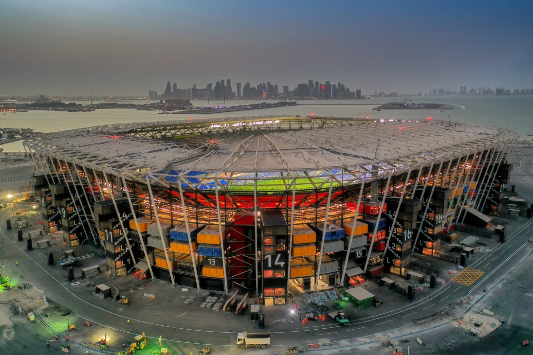 Stadium 974 in Qatar showing modular shipping container construction with steel framework and cross-ventilation openings