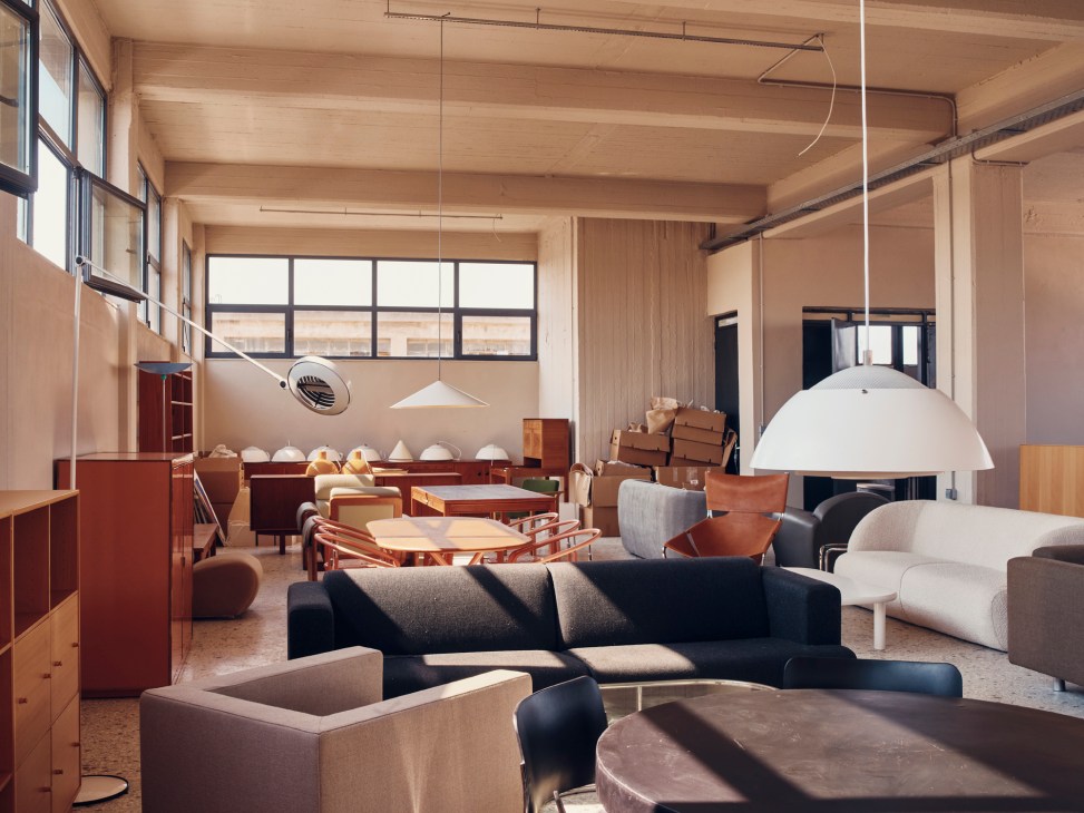 Third floor showroom displaying Nordisk Solar lights and Minotti armchairs