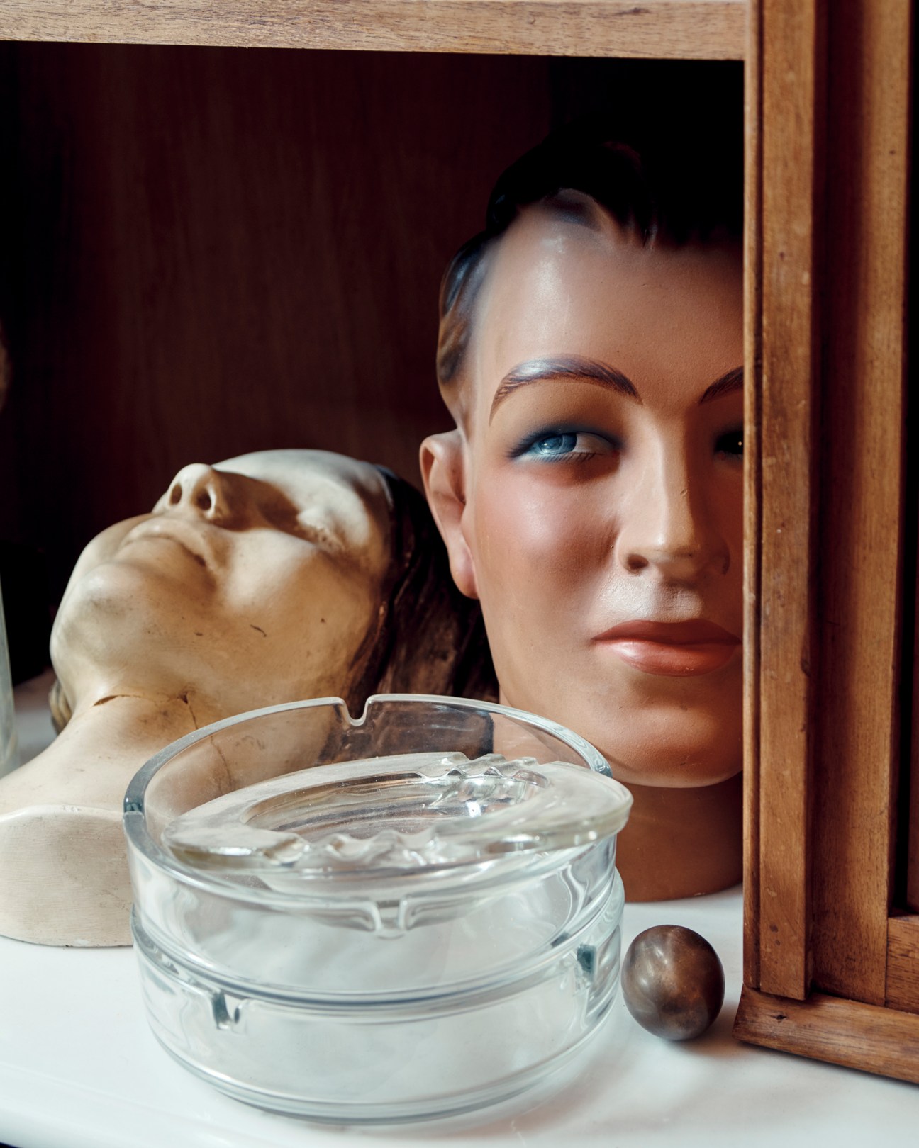 Display of vintage ashtrays and mannequin dummies available for hire