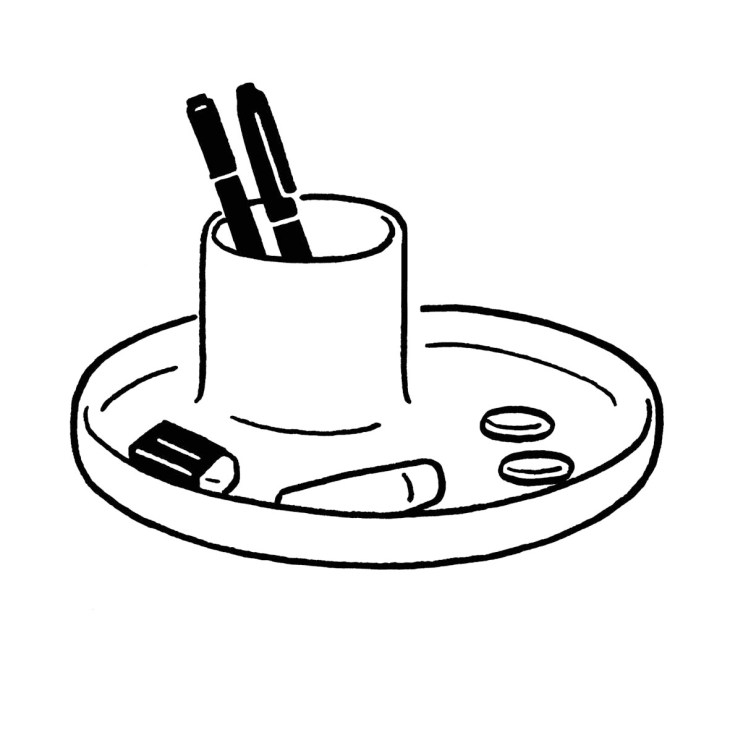 Black and white illustration of desk organizer with pens and office supplies